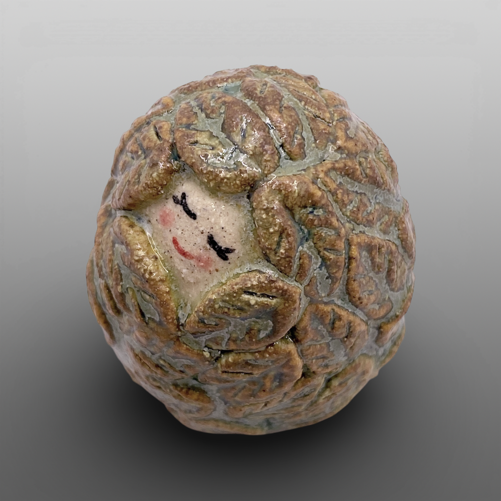 Poupée feuillage vert petite