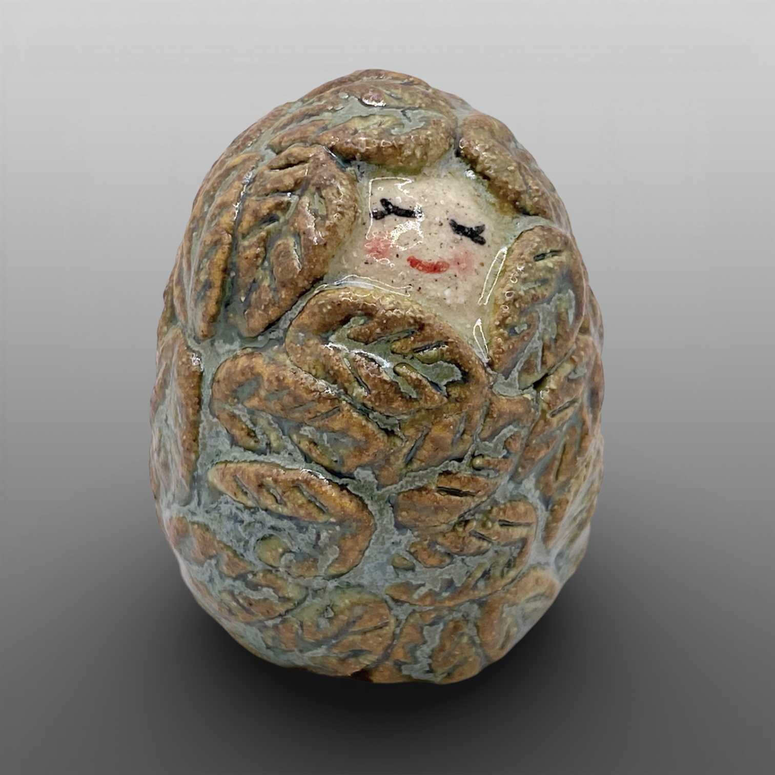 Poupée feuillage vert petite