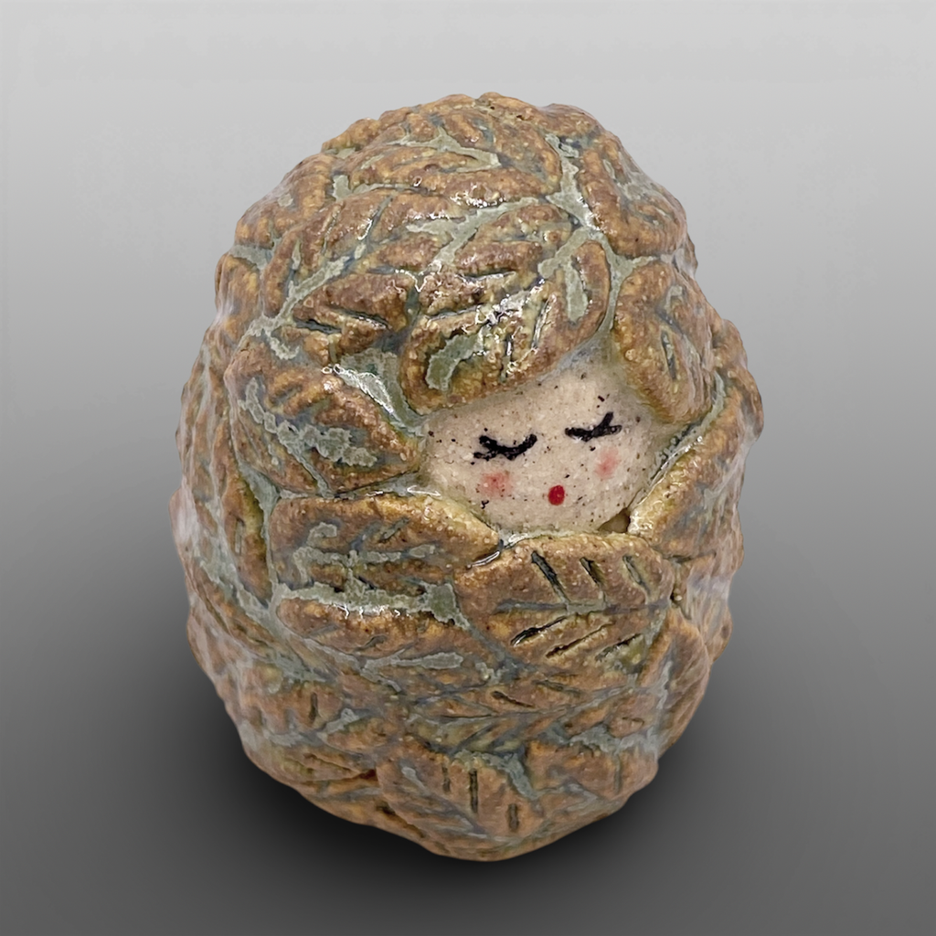 Poupée feuillage vert moyenne