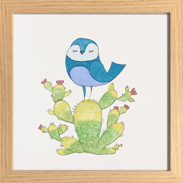 Oiseau bleu sur un cactus
