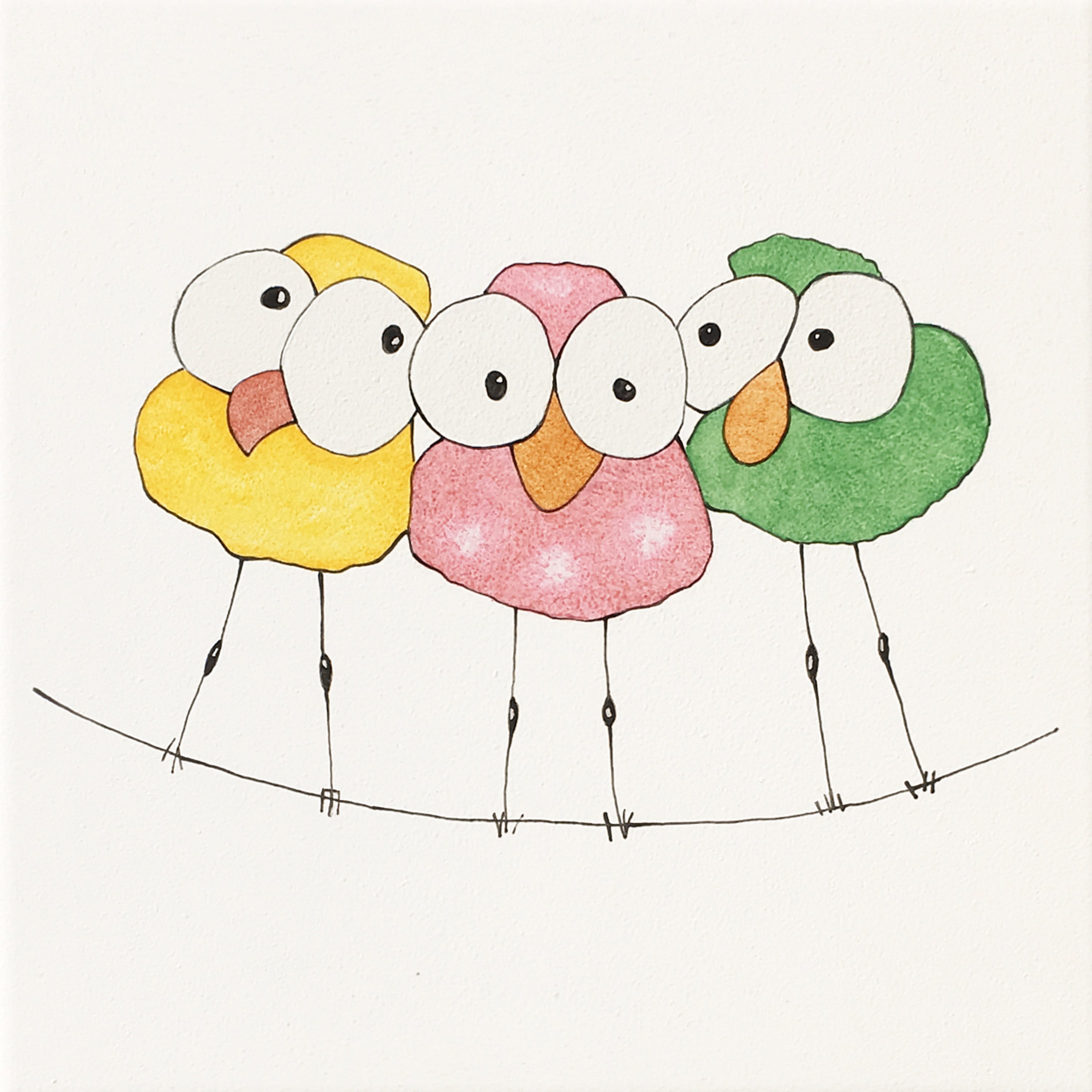 Trio d’oiseaux sur un fil
