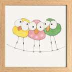 Trio d’oiseaux sur un fil