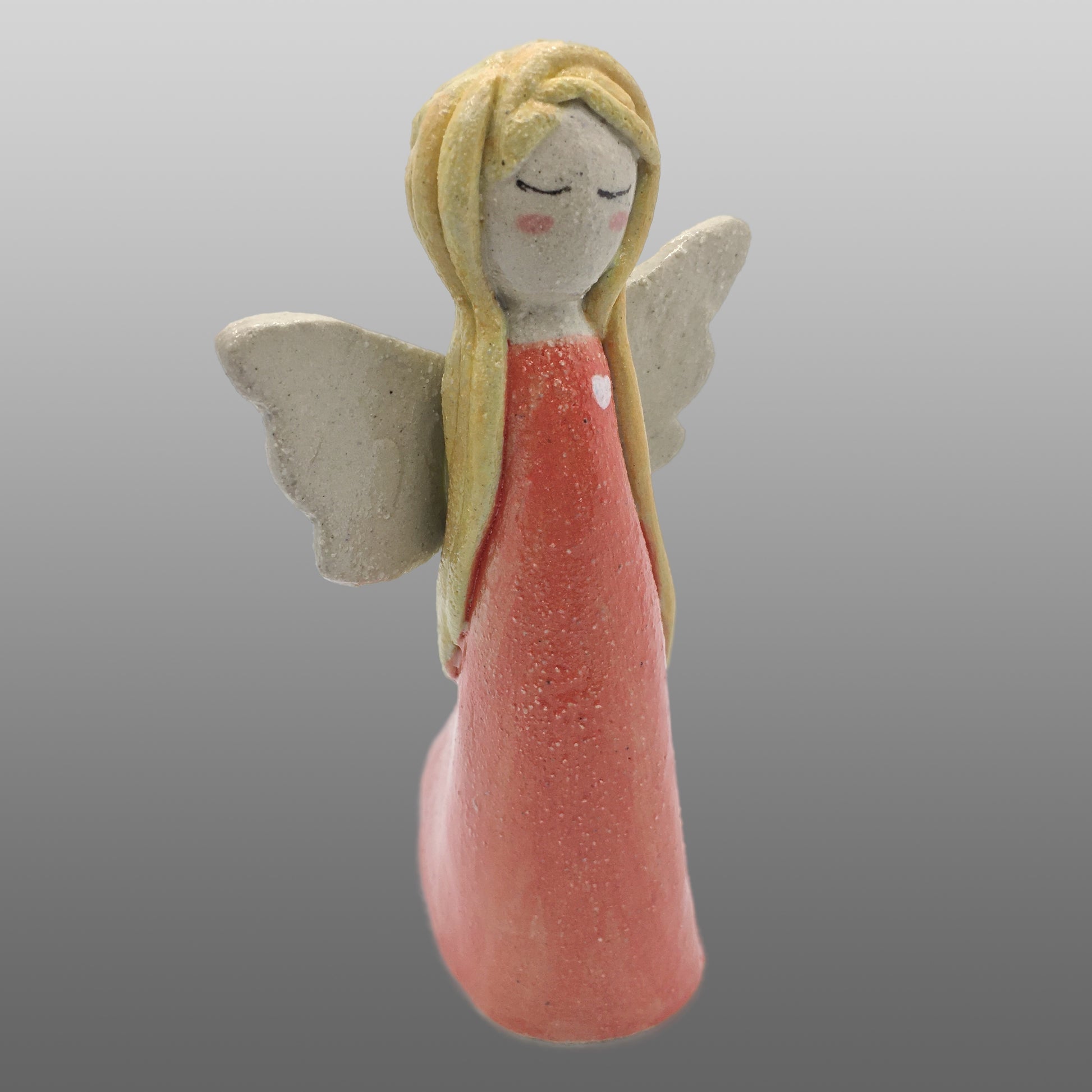 Ange fée cheveux blonds robe corail