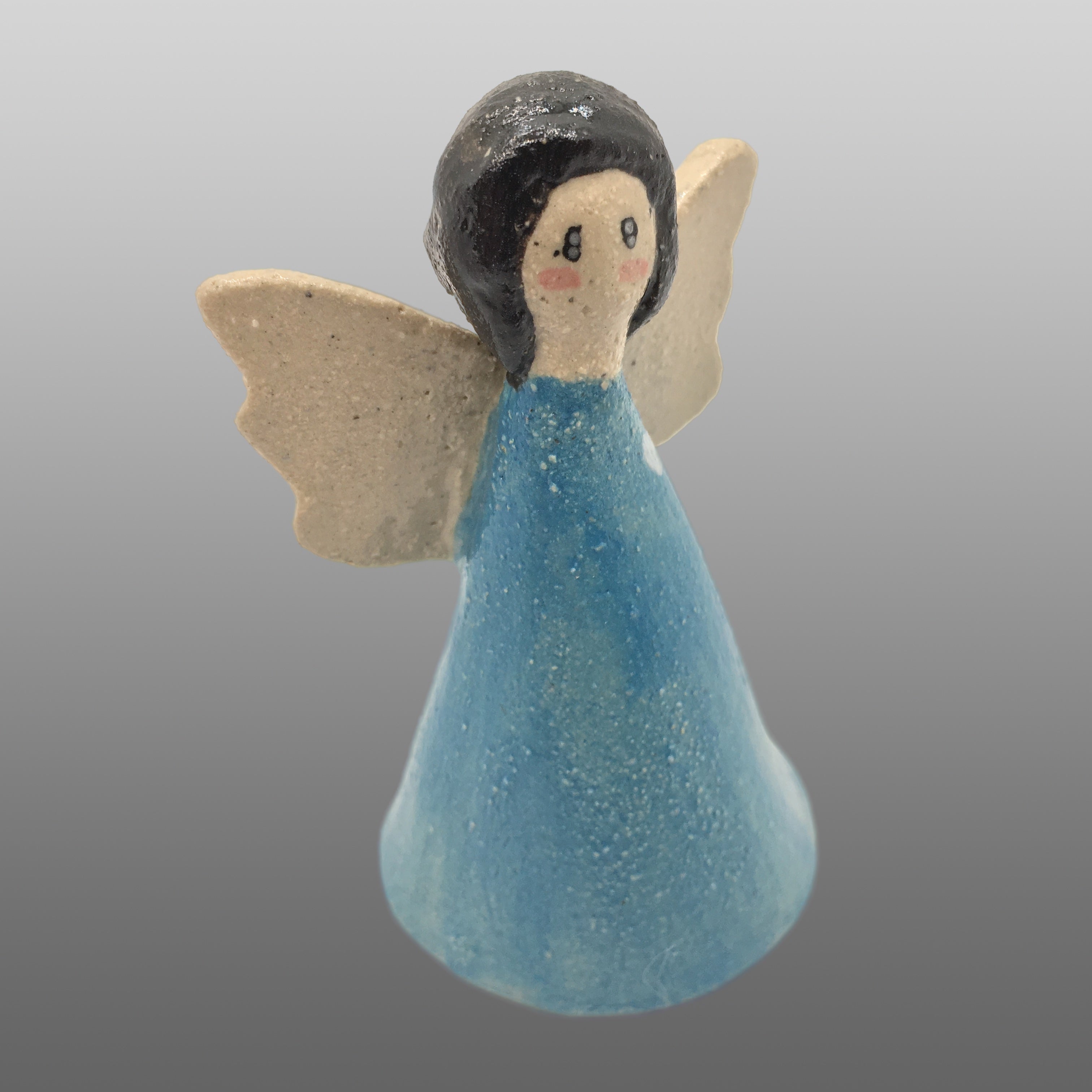 Ange fée cheveux noirs robe bleu clair