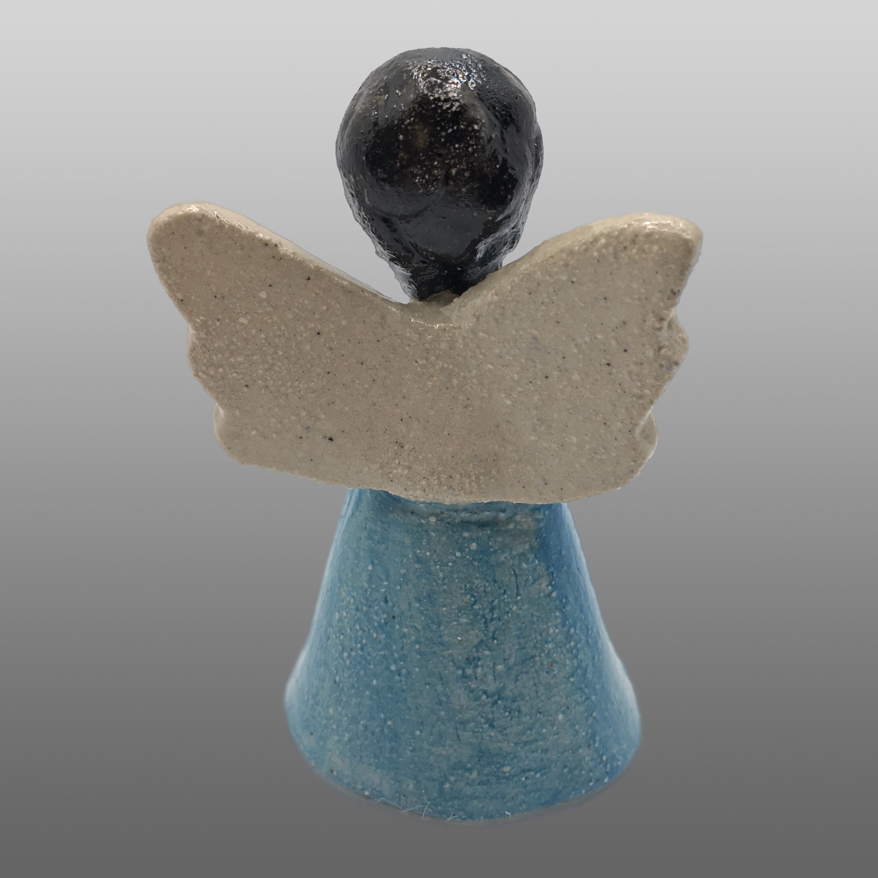 Ange fée cheveux noirs robe bleu clair